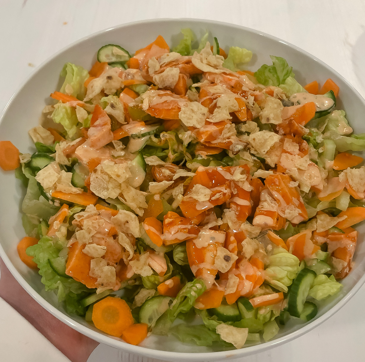 The finished buffalo chicken salad with spicy ranch dressing