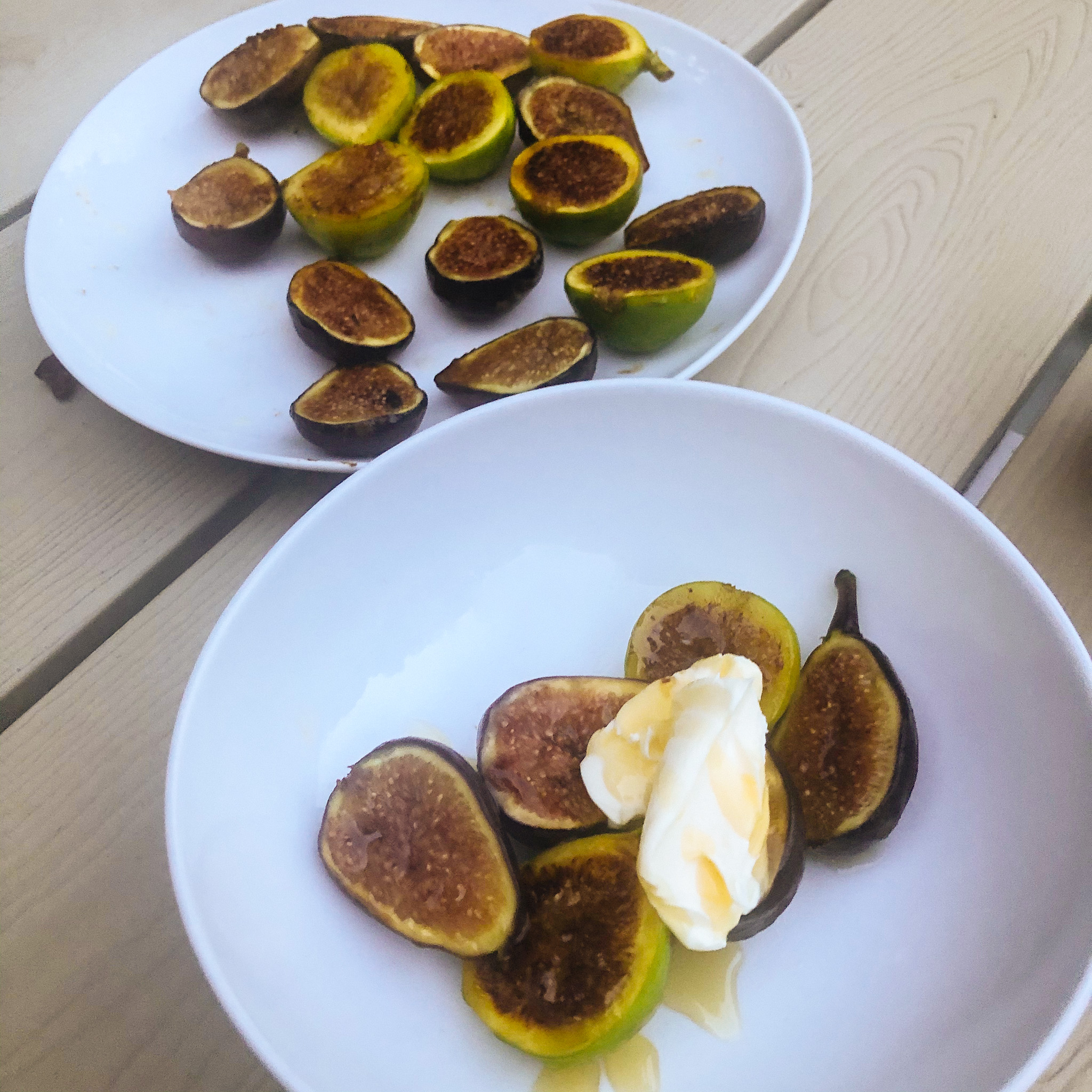 finished plate of figs with mascarpone and honey