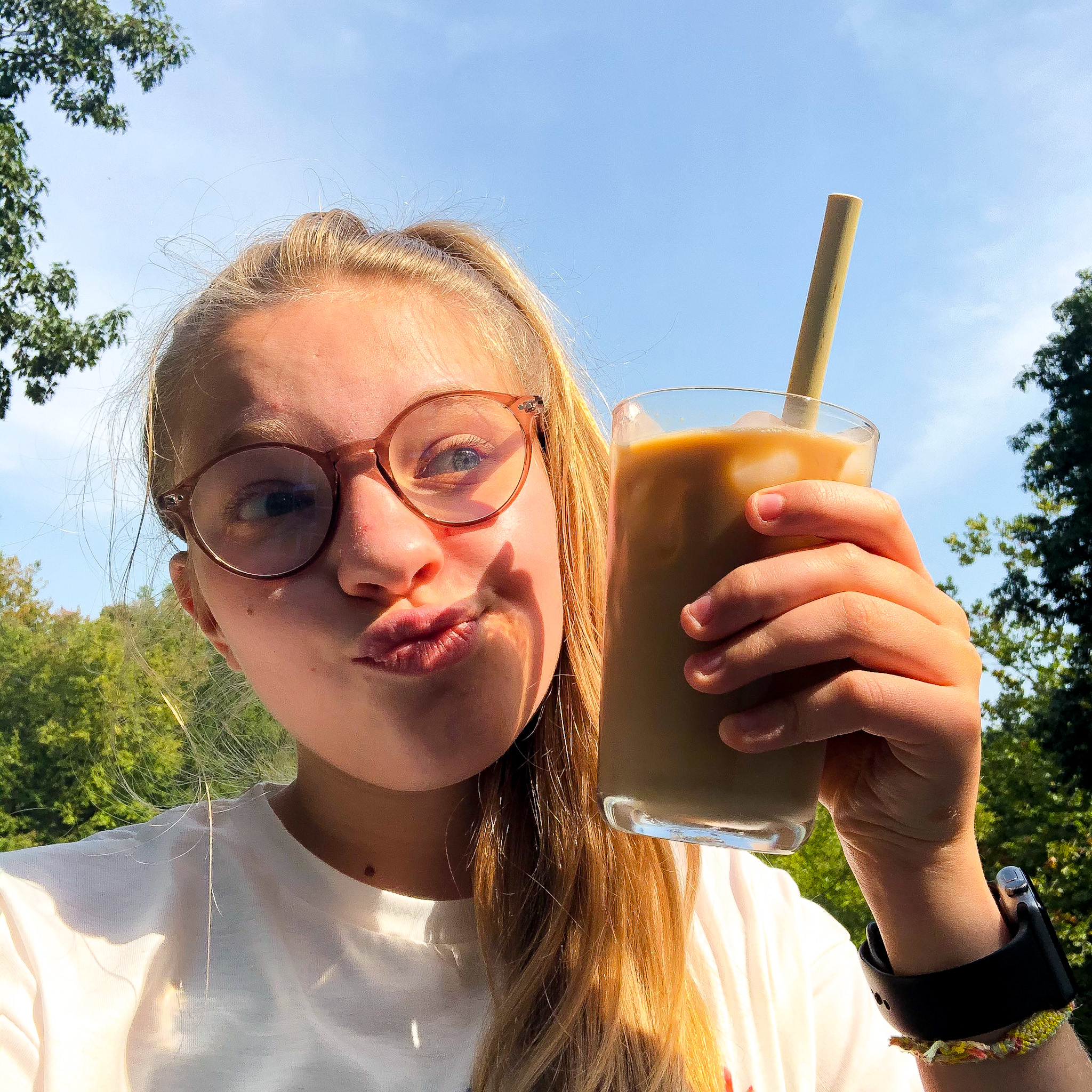 me drinking my favorite go-to iced coffee recipe